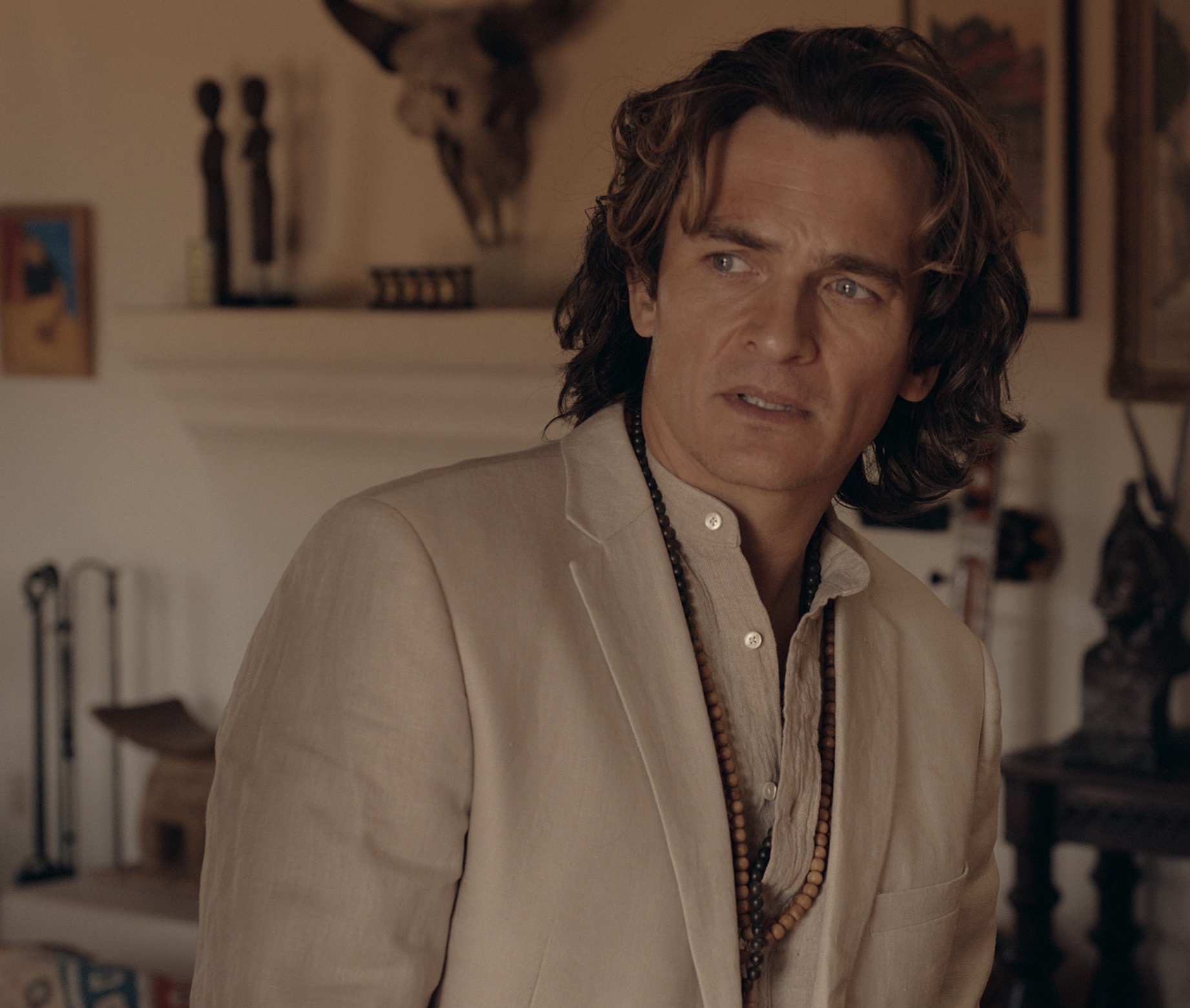 High Desert Cast on Apple TV+ - Rupert Friend as Guru Bob