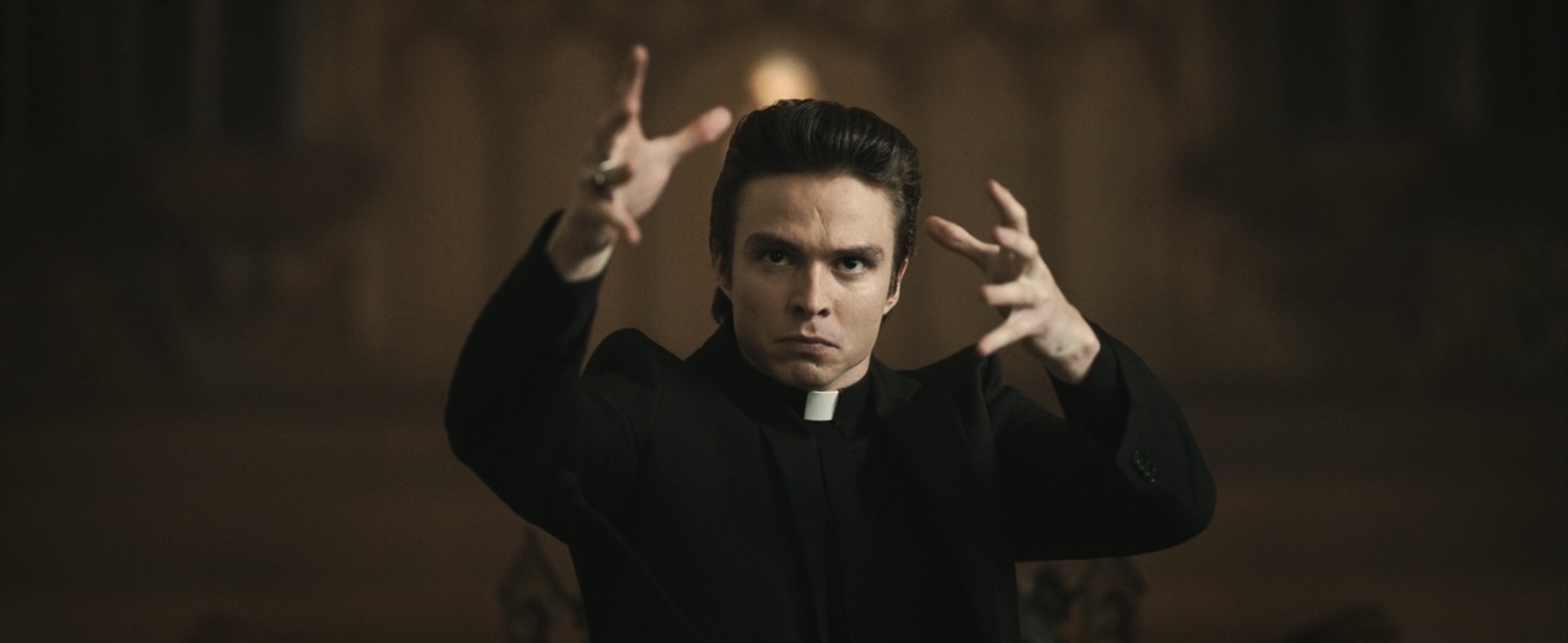 Grotesquerie Cast on FX and Hulu - Nicholas Chavez as Father Charlie Mayhew