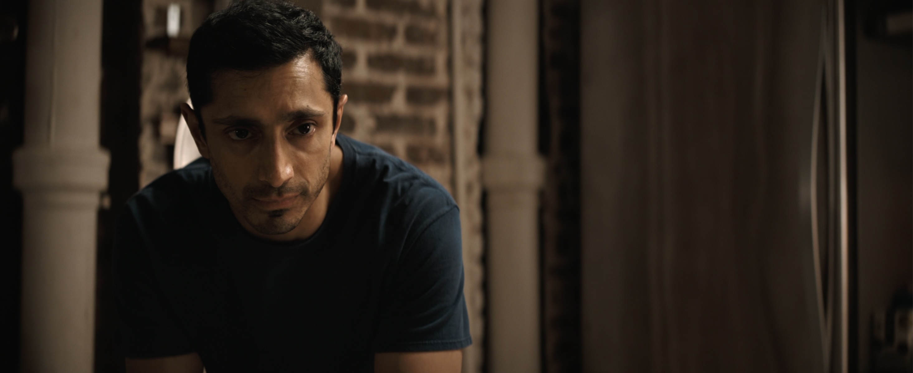 Relay Cast on Netflix - Riz Ahmed as Ash
